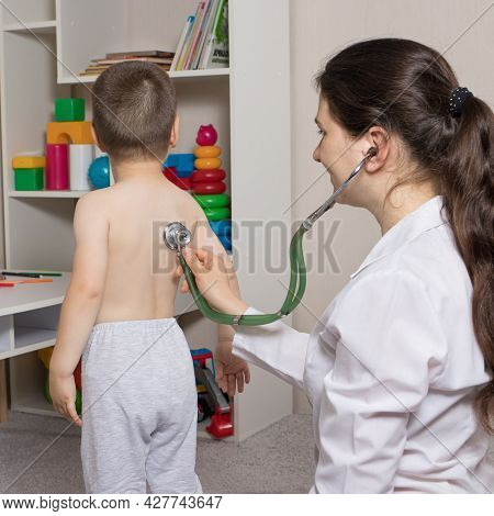 The Pediatrician Examines The Lungs And Heart Of A Slave Patient Using A Phonendoscope. Ausculation,