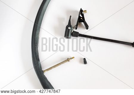 Inner Tube With Presta Valve Or French Valve On Background.