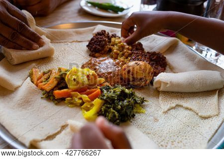 Vegetarian Injera Meal, With Shiro, Lentils, Egg And A Variety Of Vegetables