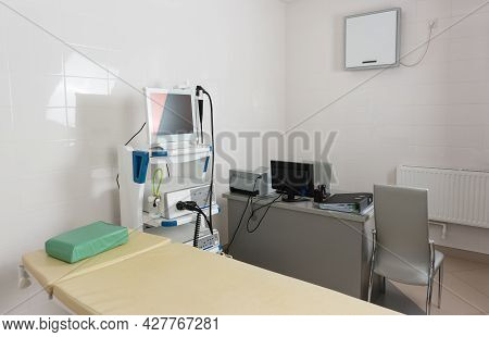 Medical Equipment For Video-esophagogastroduodenoscopy In The Clinic Office. A Patients Couch And A 