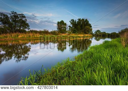 Sunset Over Warta River In Warta Landscape Park, Lad, Poland.