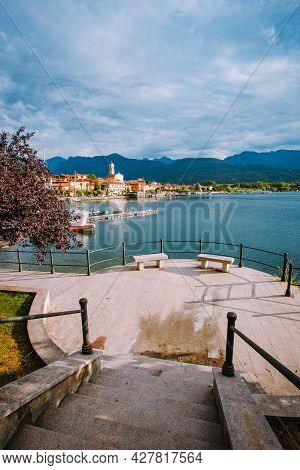 Feriolo, Verbania / Italy - June 2021: Feriolo Village On Lake Maggiore With Cloudy Sky And Steps To
