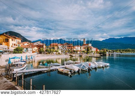 Feriolo, Verbania / Italy - June 2021: Feriolo Village On Lake Maggiore With Cloudy Sky With Small B