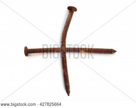 Aerial View Of Two Isolated Rusty Nails. Close Up Of Old Wry Rusty Nail Shot From Above On White. Ha