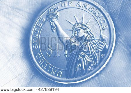 Us Coin Lies On The Palm. 1 One Dollar Coin Close-up. Light Pale Blue Tinted Wallpaper. Economic, Fi