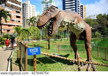 Dinosaur Sculpture In Park