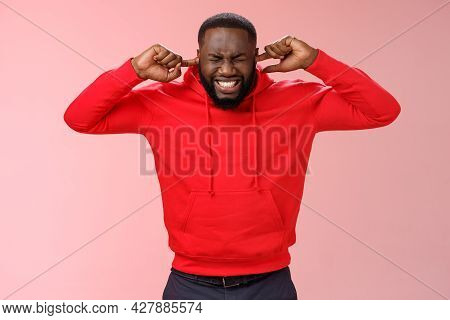 Annoyed Bothered Uncomfortable Young African-american Pressured And Stressed Bearded Guy Clench Teet