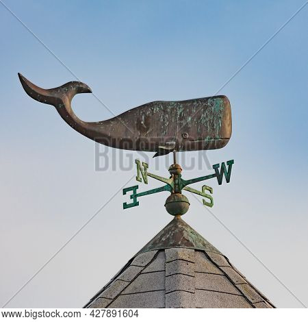 Sperm Whale, Physeter Macrocephalus, Corroded Metal Weather Vane On Top Of Roof