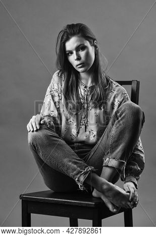 She Got Great Style. Lonely Woman Sit On Chair. Phycology. Portrait Of Woman With Beauty Face. Femal