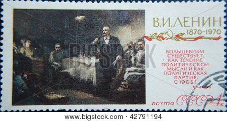 Russland ca. 1970: Briefmarke gedruckt von UdSSR zeigt sozialistischen Lider Lenin GesprÃ¤ch mit Menschen