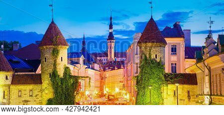 Tallinn, Estonia - July 26: Night View Of Famous Viru Gate - Part Old Town Architecture Estonian Cap