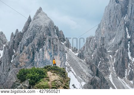 Backpacker With Backpack Enjoying The Turquoise Lago Di Sorapiss 1,925m Altitude (mountain Lake) Vie