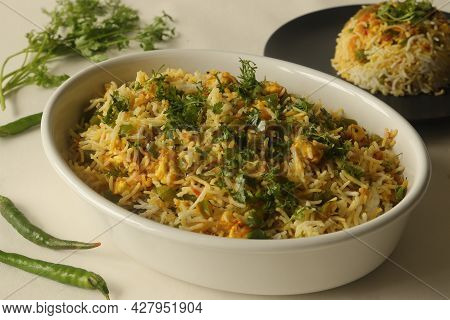 Steamed Basmati Rice Tossed With A Semi Dry Gravy Of Cottage Cheese And Bell Peppers. Commonly Known