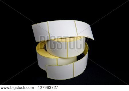 Blank Label Stickers. White Roll Of Labels For Thermal Perforation. Sticky Label Roll