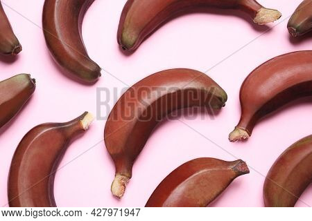 Tasty Red Baby Bananas On Pink Background, Flat Lay