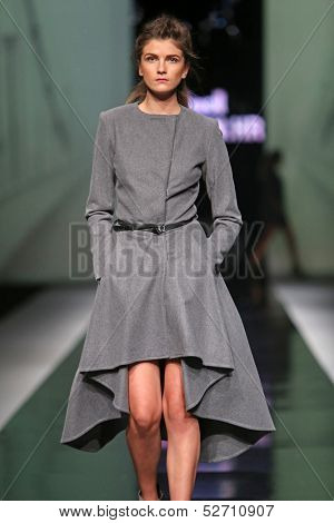 ZAGREB, CROATIA - OCTOBER 19: Fashion model wearing clothes designed by Pavla Aleksic on the 'Fashion.hr' show on October 19, 2013 in Zagreb, Croatia.