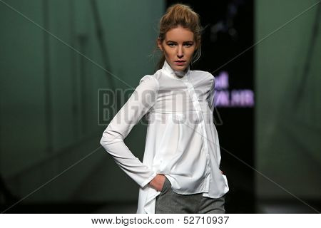 ZAGREB, CROATIA - OCTOBER 19: Fashion model wearing clothes designed by Pavla Aleksic on the 'Fashion.hr' show on October 19, 2013 in Zagreb, Croatia.