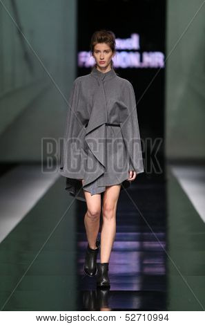 ZAGREB, CROATIA - OCTOBER 19: Fashion model wearing clothes designed by Pavla Aleksic on the 'Fashion.hr' show on October 19, 2013 in Zagreb, Croatia.
