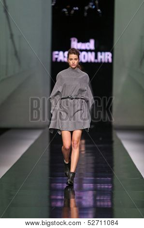 ZAGREB, CROATIA - OCTOBER 19: Fashion model wearing clothes designed by Pavla Aleksic on the 'Fashion.hr' show on October 19, 2013 in Zagreb, Croatia.
