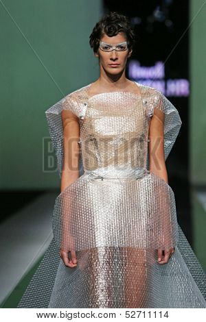ZAGREB, CROATIA - OCTOBER 19: Fashion model wearing clothes designed by Branka Donassy on the 'Fashion.hr' show on October 19, 2013 in Zagreb, Croatia.
