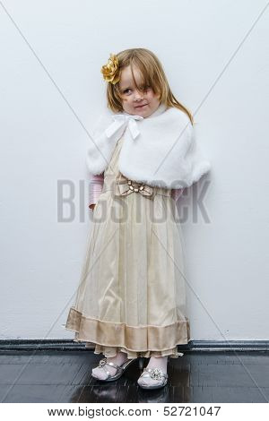 Cute Little Girl Trying On Dress