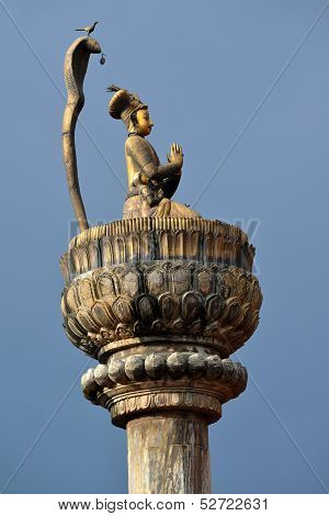 King Yoganarendra Malla bronze statue, under cobra snake. Patan, Nepal