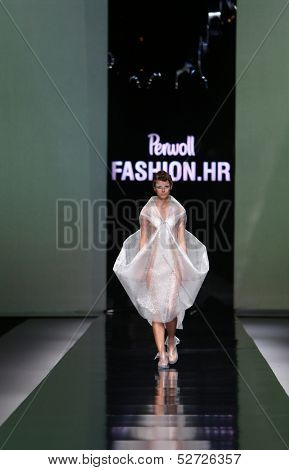 ZAGREB, CROATIA - OCTOBER 19: Fashion model wearing clothes designed by Branka Donassy on the 'Fashion.hr' show on October 19, 2013 in Zagreb, Croatia.
