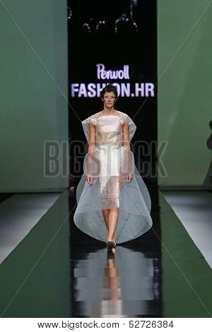 ZAGREB, CROATIA - OCTOBER 19: Fashion model wearing clothes designed by Branka Donassy on the 'Fashion.hr' show on October 19, 2013 in Zagreb, Croatia.