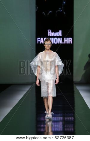 ZAGREB, CROATIA - OCTOBER 19: Fashion model wearing clothes designed by Branka Donassy on the 'Fashion.hr' show on October 19, 2013 in Zagreb, Croatia.