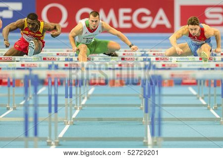 GOTHENBURG, SWEDEN - MARCH 1 Balazs Baji (Hungary) wins heat 2 of the qualification of the men's 60m hurdles event during the Athletics Indoor Championship on March 1, 2013 in Gothenburg, Sweden.