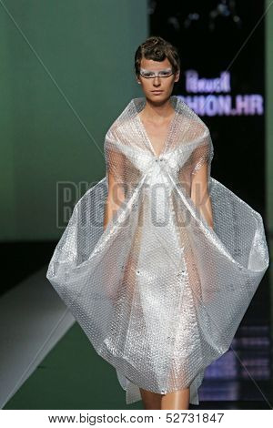 ZAGREB, CROATIA - OCTOBER 19: Fashion model wearing clothes designed by Branka Donassy on the 'Fashion.hr' show on October 19, 2013 in Zagreb, Croatia.