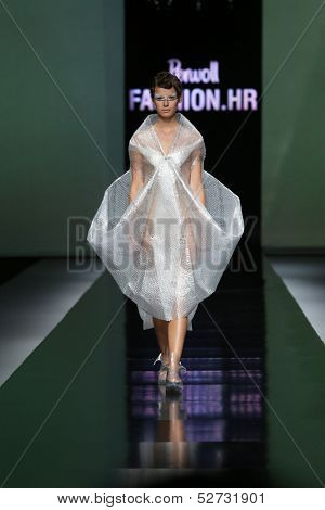 ZAGREB, CROATIA - OCTOBER 19: Fashion model wearing clothes designed by Branka Donassy on the 'Fashion.hr' show on October 19, 2013 in Zagreb, Croatia.