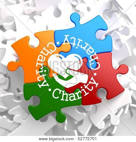 Charity Concept on Multicolor Puzzle.