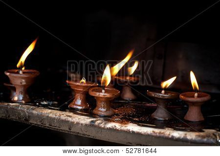Burning oil lamps. Nepal