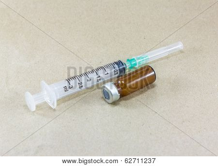 Medical Bottle And Syringe