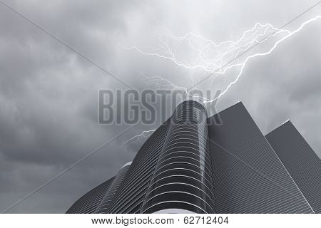 Bottom image of skyscraper with thunder lightning in sky