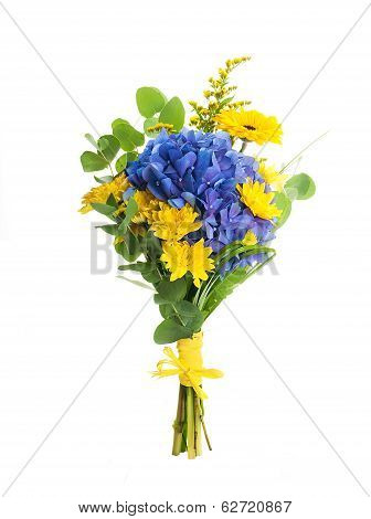 Bouquet from blue hydrangeas and yellow asters, a flower background