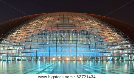 BEIJING, CHINA - APR 3: National Centre for the Performing Arts NCPA at night on April 3, 2013 in Beijing, China. Cost 2.8B CNY, it seats 5,452 people. The first performance was held in December 2007