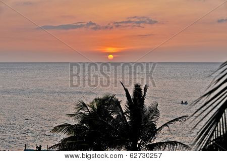 An orange Sun setting in Cuba