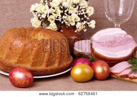 Traditional Easter cake and pork loin dish with easter eggs