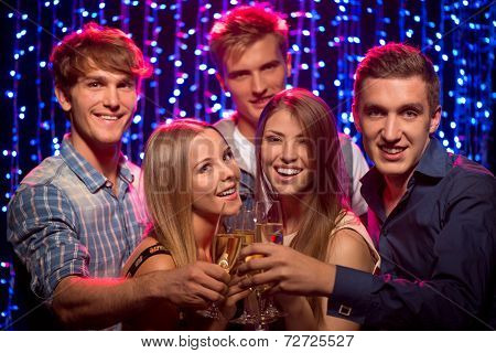 Friends at party in night club