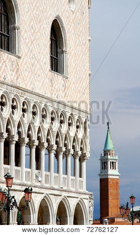 Columns Of The Ducal Palace With The Bell Tower Of St. George