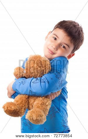 Boy Hugging A Teddy Bear