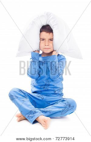 Boy In Pajamas With A Pillow