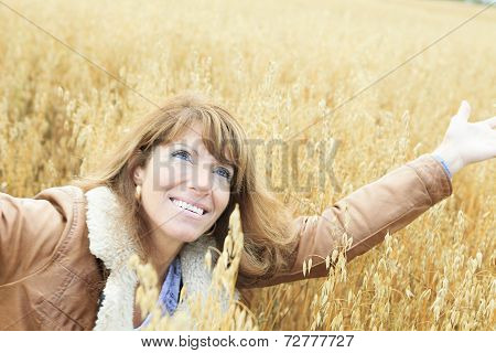 Woman on wheat Big Smile