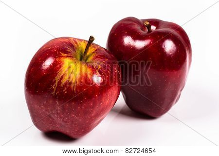 Two Red Delicious Apple On A White Background