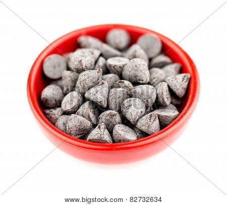 Bowl Filled With Chocolate Chips Isolated On White