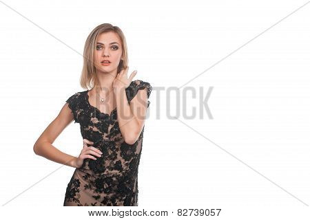 Trendy young woman in guipure dress