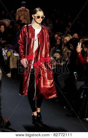 NEW YORK - FEBRUARY 13: A model walks the runway at the Mongol Fall/Winter 2015 collection during Mercedes-Benz Fashion Week in New York on February 13, 2015.