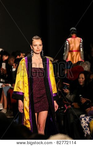 NEW YORK - FEBRUARY 13: A model walks the runway at the Mongol Fall/Winter 2015 collection during Mercedes-Benz Fashion Week in New York on February 13, 2015.